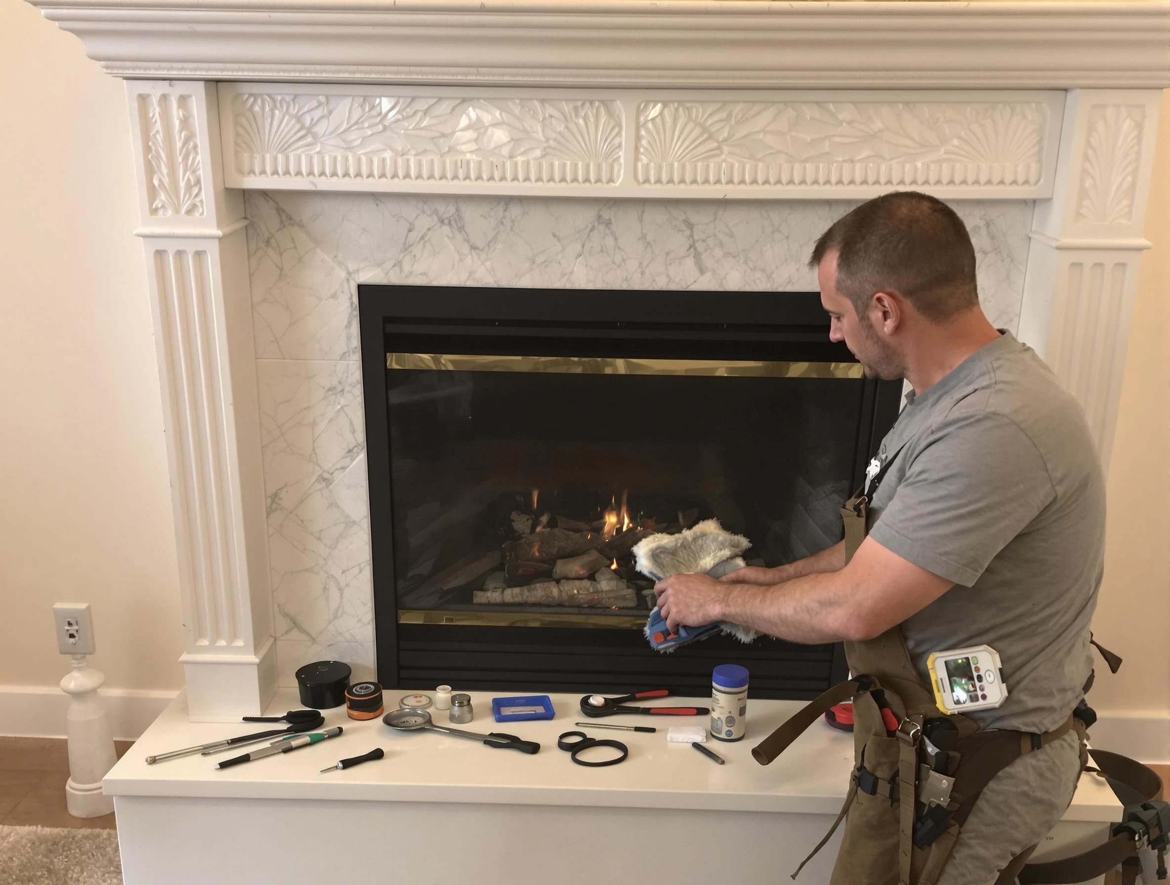 Johnston Chimney Sweep performing fireplace maintenance in Johnston, RI